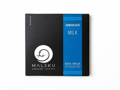 A rectangular package of Maleku 60% Milk Chocolate, featuring a black upper half with a white circular logo and a bright blue lower half with white text, set against a plain white background.
